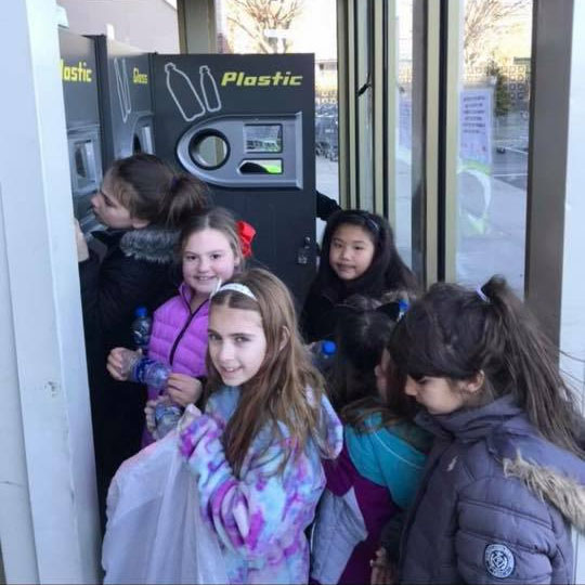 Girl Scouts Collecting Recycleables