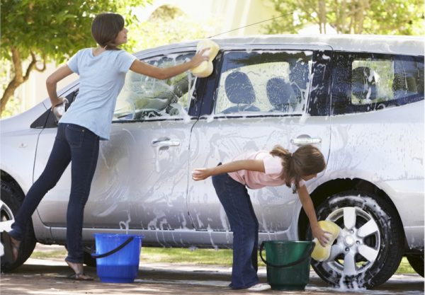 Youth Squad® Volunteers Raise Funds with a Car Wash.